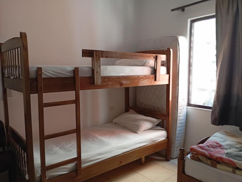 Postel nebo postele na pokoji v ubytování Blue Diamond HOSTEL Him Kolli STREET BUILDING NO 4