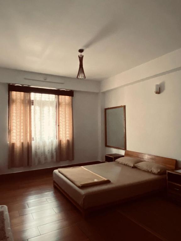 Postel nebo postele na pokoji v ubytování Denkhang bnb Geyzing west sikkim