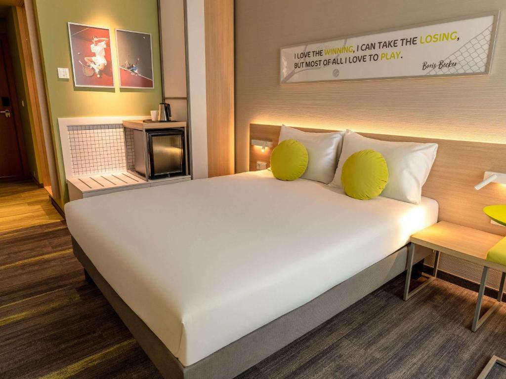 Postel nebo postele na pokoji v ubytování ibis Styles Chisinau