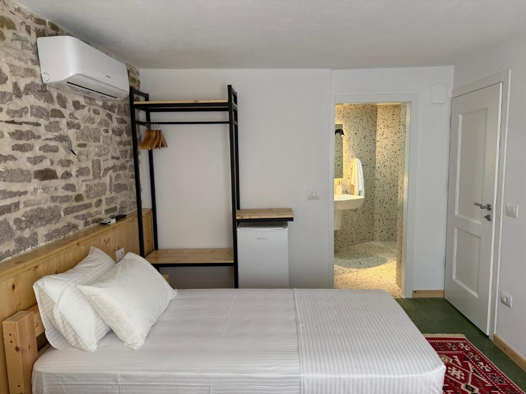 Postel nebo postele na pokoji v ubytování Te Ajdini Guesthouse