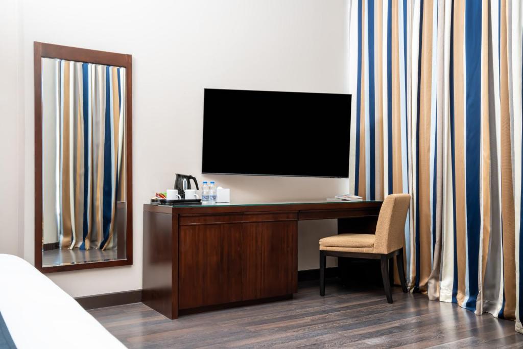 TV o dispositivi per l'intrattenimento presso Millennium Central Doha