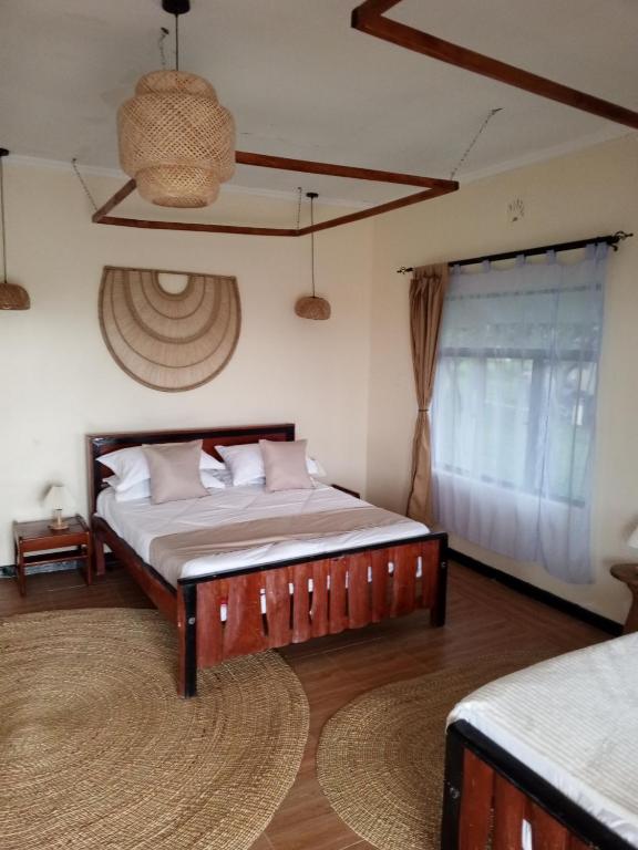 Postel nebo postele na pokoji v ubytování Narasha homestay