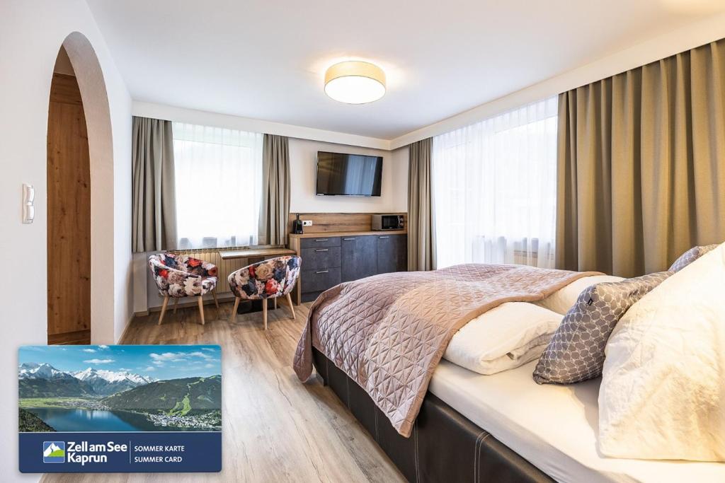 TV a/nebo společenská místnost v ubytování Appartements by Hofer