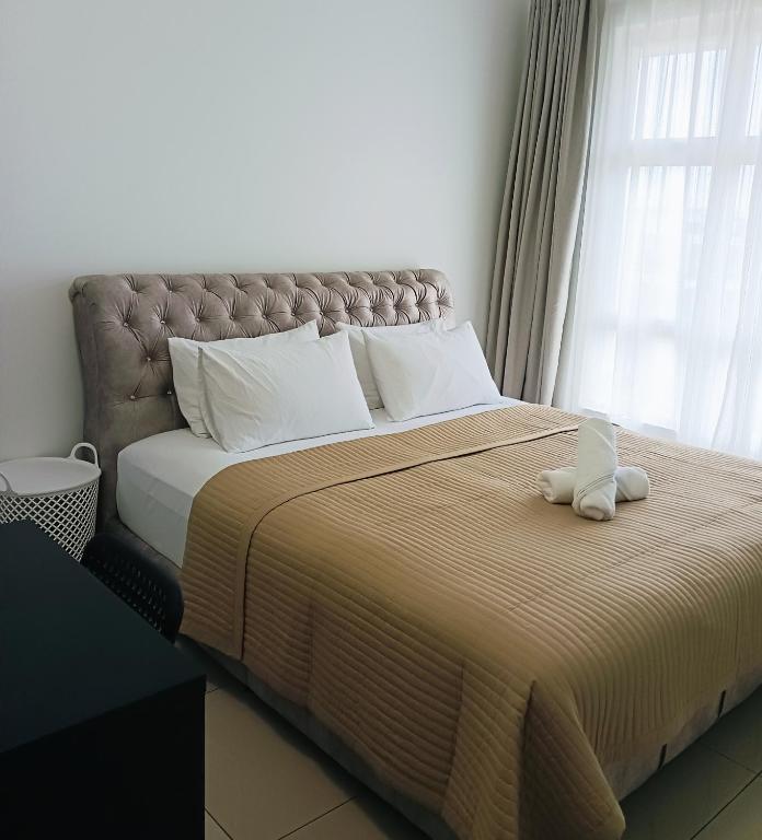 Postel nebo postele na pokoji v ubytování Mslim Friendly Stay at Bayu Aisyah Putrajaya, Presint 11
