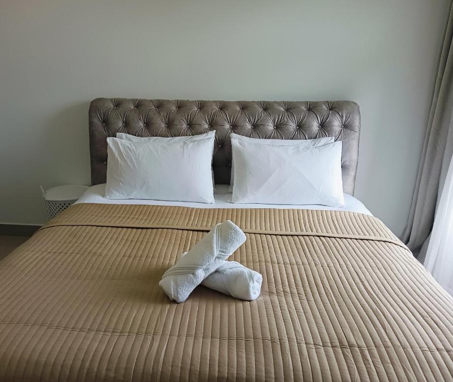 Postel nebo postele na pokoji v ubytování Mslim Friendly Stay at Bayu Aisyah Putrajaya, Presint 11