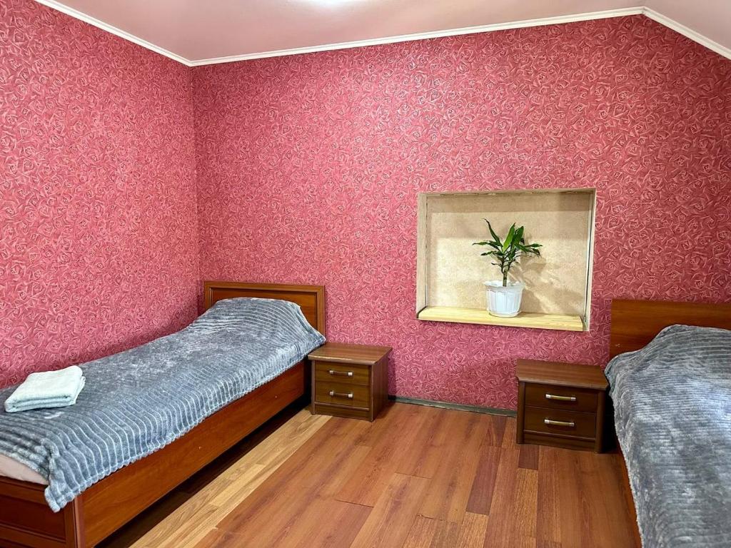 Letto o letti in una camera di JOKER Hotel
