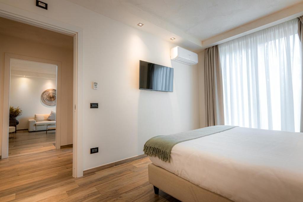 Postel nebo postele na pokoji v ubytování Casabianca Resort