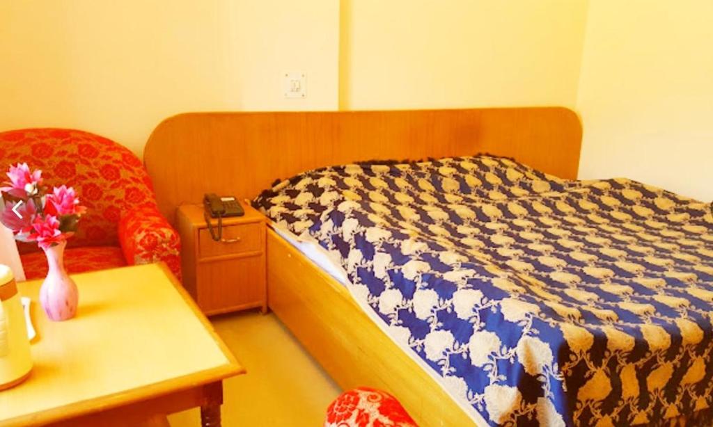 Postel nebo postele na pokoji v ubytování Hotel Mount View NXE