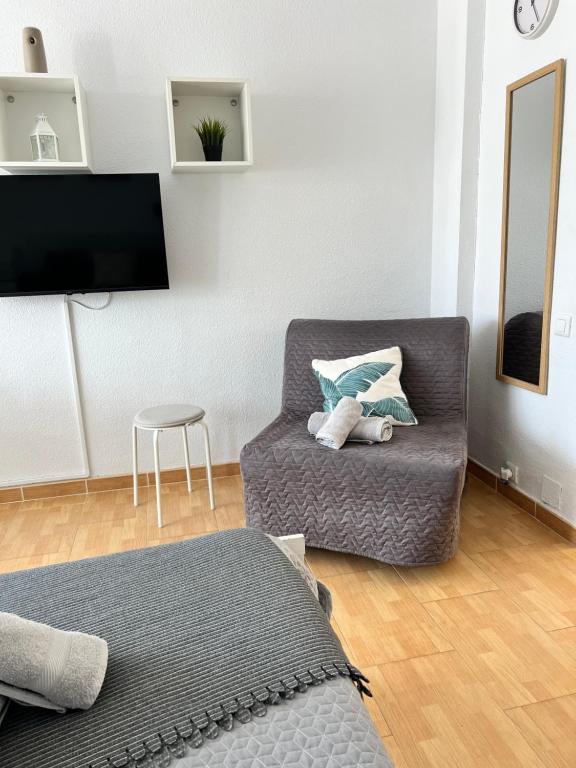TV a/nebo společenská místnost v ubytování Holiday apartment Edificio Iris, Benalmádena