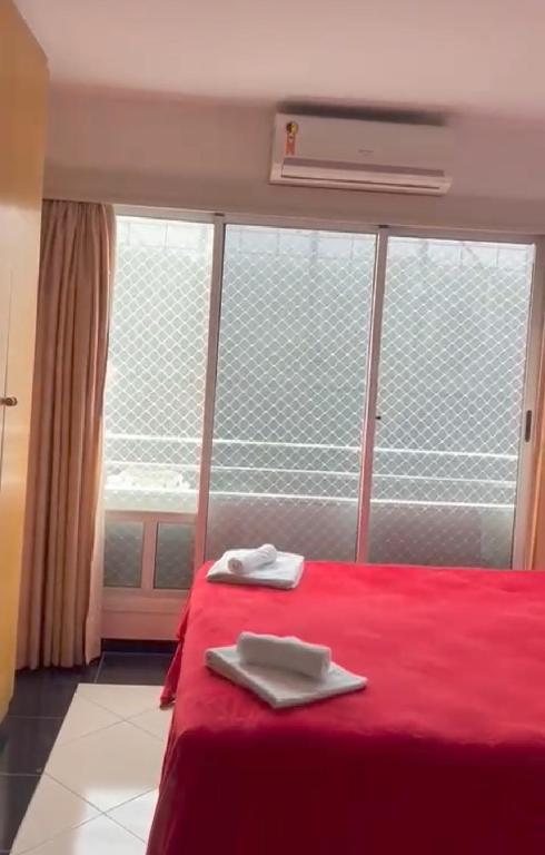 Postel nebo postele na pokoji v ubytování Flats em frente ao Allianz Parque - HOTEL EM PERDIZES