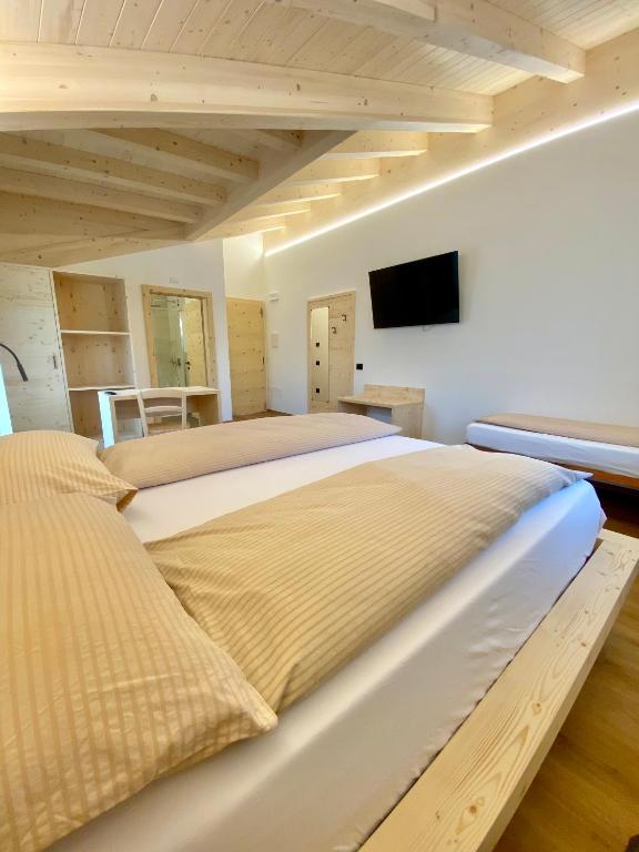 Postel nebo postele na pokoji v ubytování Agritur Casamela