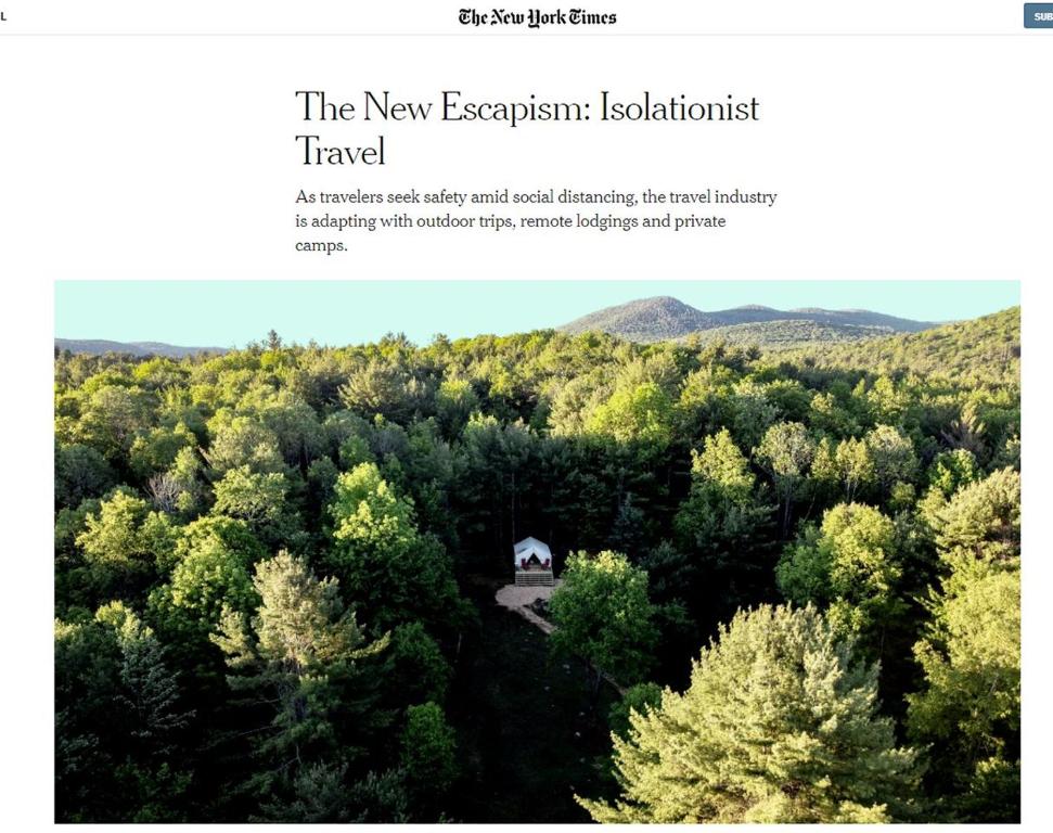 an aerial view of a forest with a house in the middle at Gorgeous Safari Tent Rental Ideal for Glamping in Upstate New York in Wevertown