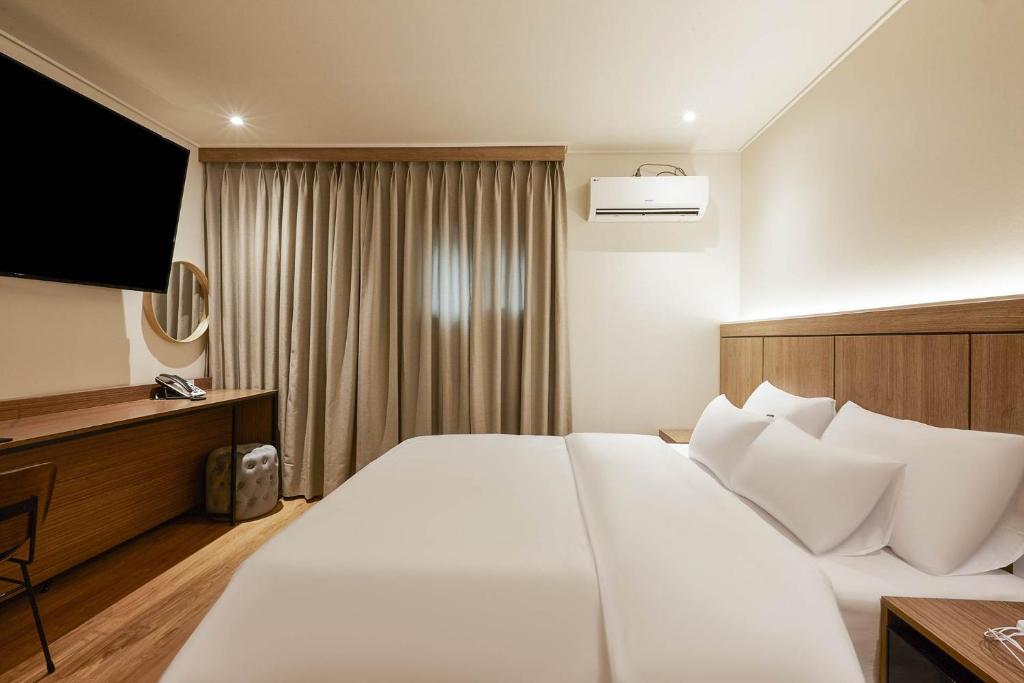 Postel nebo postele na pokoji v ubytování vane hotel