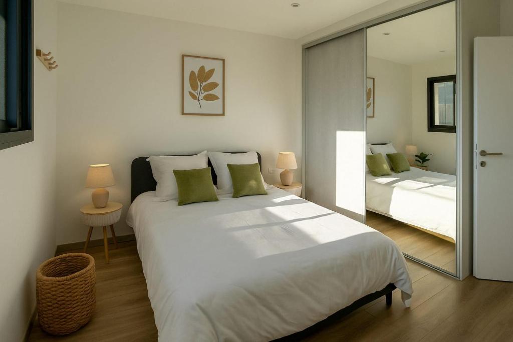 Postel nebo postele na pokoji v ubytování Maison relax & spa en Bretagne