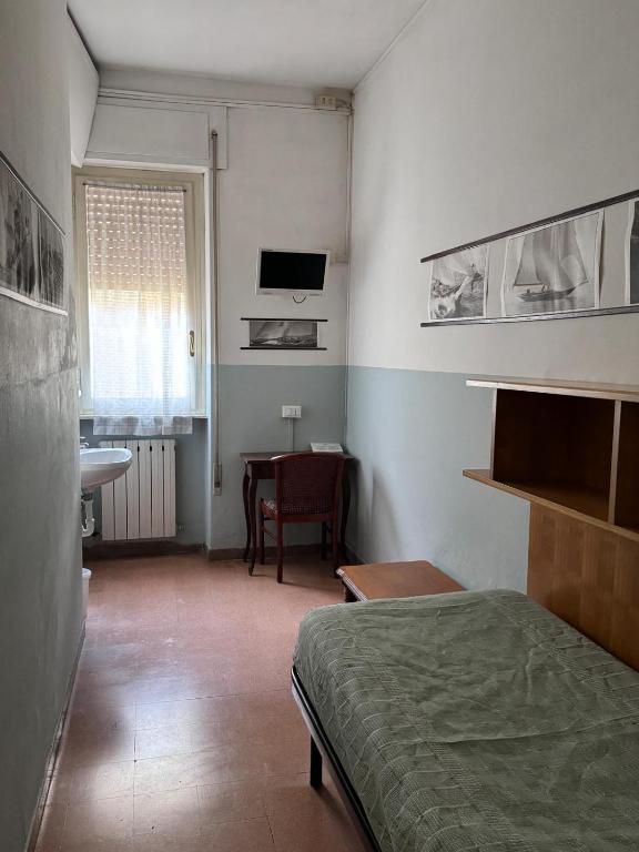 Postel nebo postele na pokoji v ubytování Hotel Ely