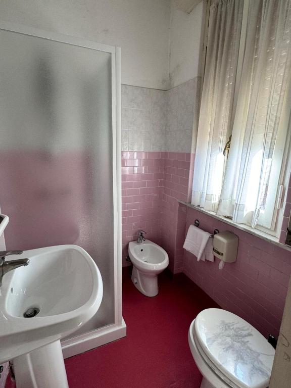 Koupelna v ubytování Hotel Ely