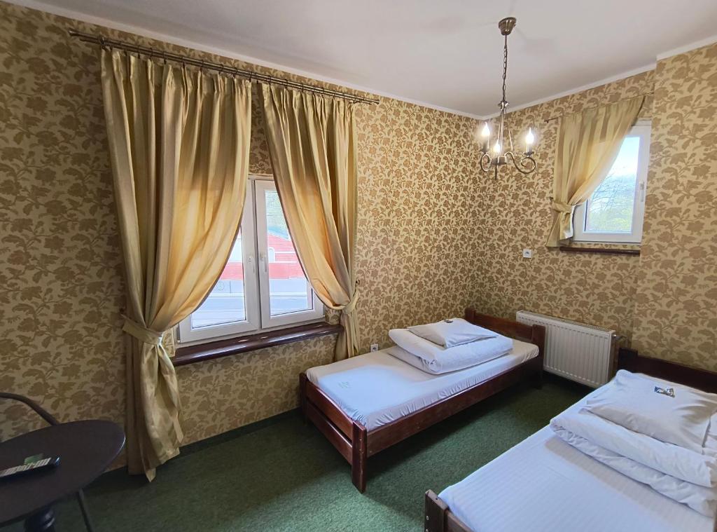 Posteľ alebo postele v izbe v ubytovaní Green Hostel Wrocław przy ZOO