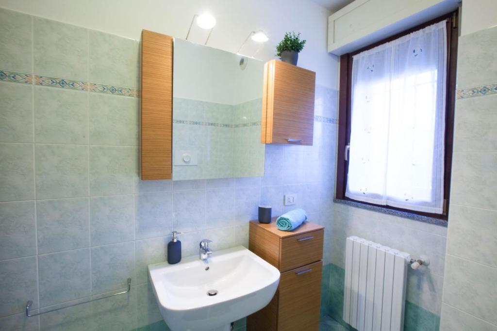 Koupelna v ubytování CaseOspitali - Casa I Giardini, bilocale a pochi passi dal San Raffaele