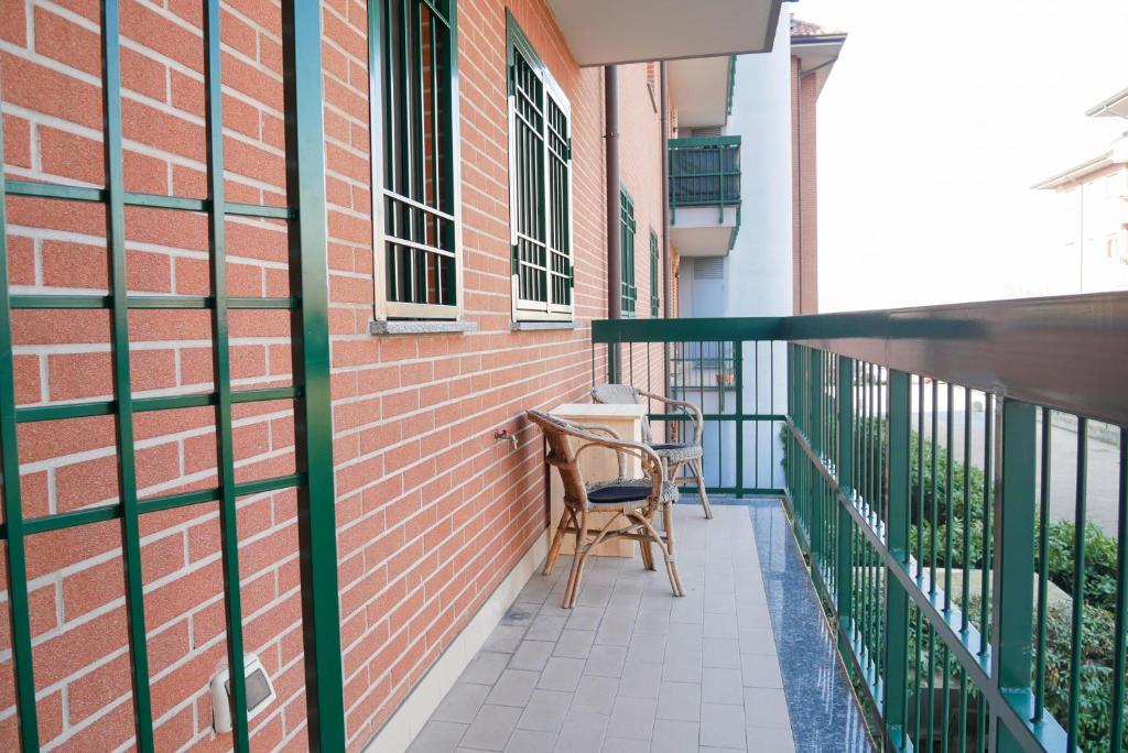 Balkón nebo terasa v ubytování CaseOspitali - Casa I Giardini, bilocale a pochi passi dal San Raffaele
