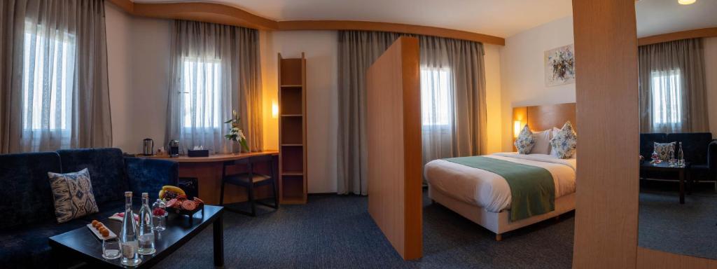 Postel nebo postele na pokoji v ubytování Hôtel La Perle de Mogador