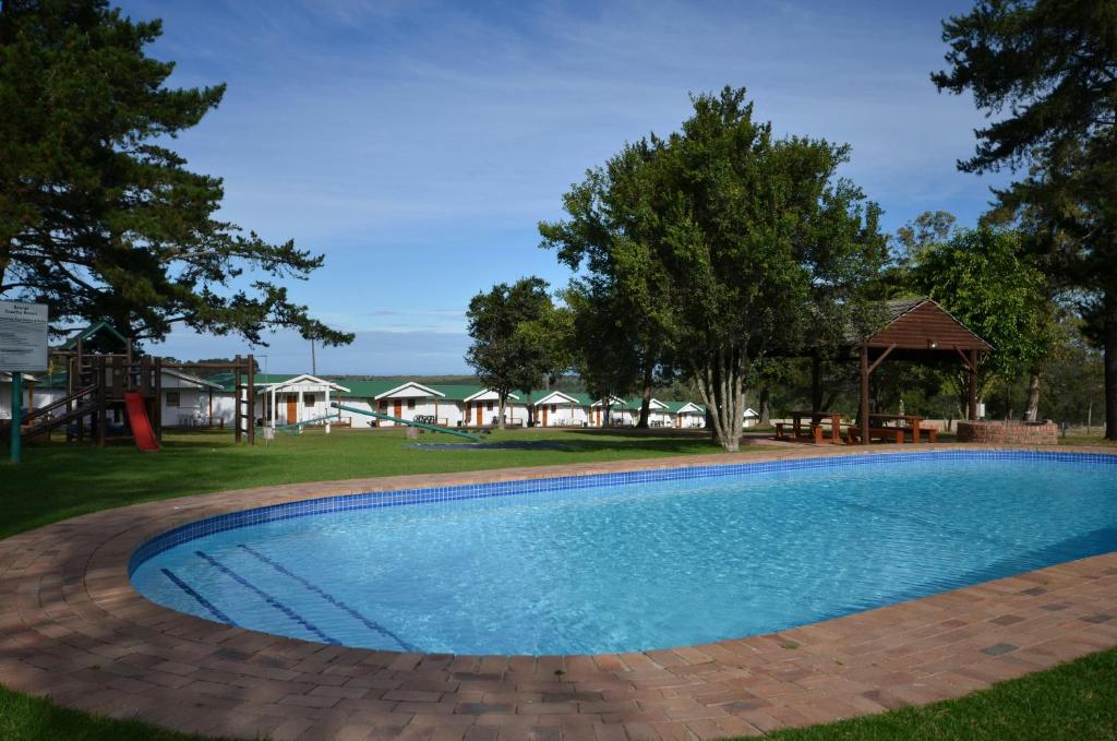 Bazén v ubytování George Resort nebo v jeho okolí