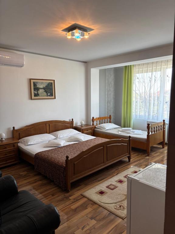 Ένα ή περισσότερα κρεβάτια σε δωμάτιο στο Casa Ana