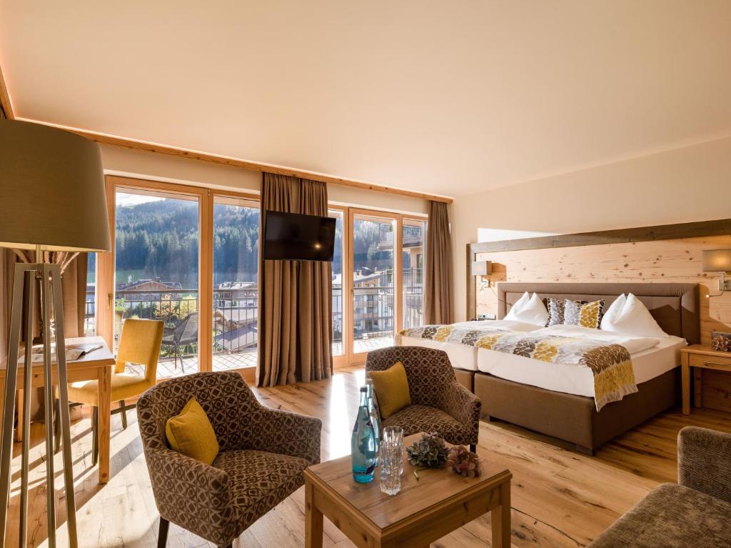 Postel nebo postele na pokoji v ubytování Hotel Zentral ****superior