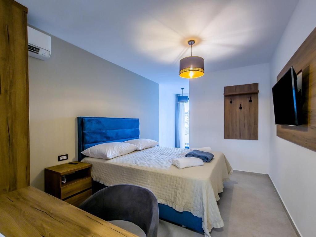 Postel nebo postele na pokoji v ubytování Sunrise Beachfront Residence