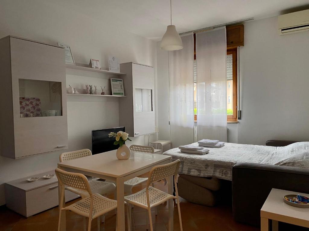 Postel nebo postele na pokoji v ubytování Casa Gaia- Castelnuovo del Garda