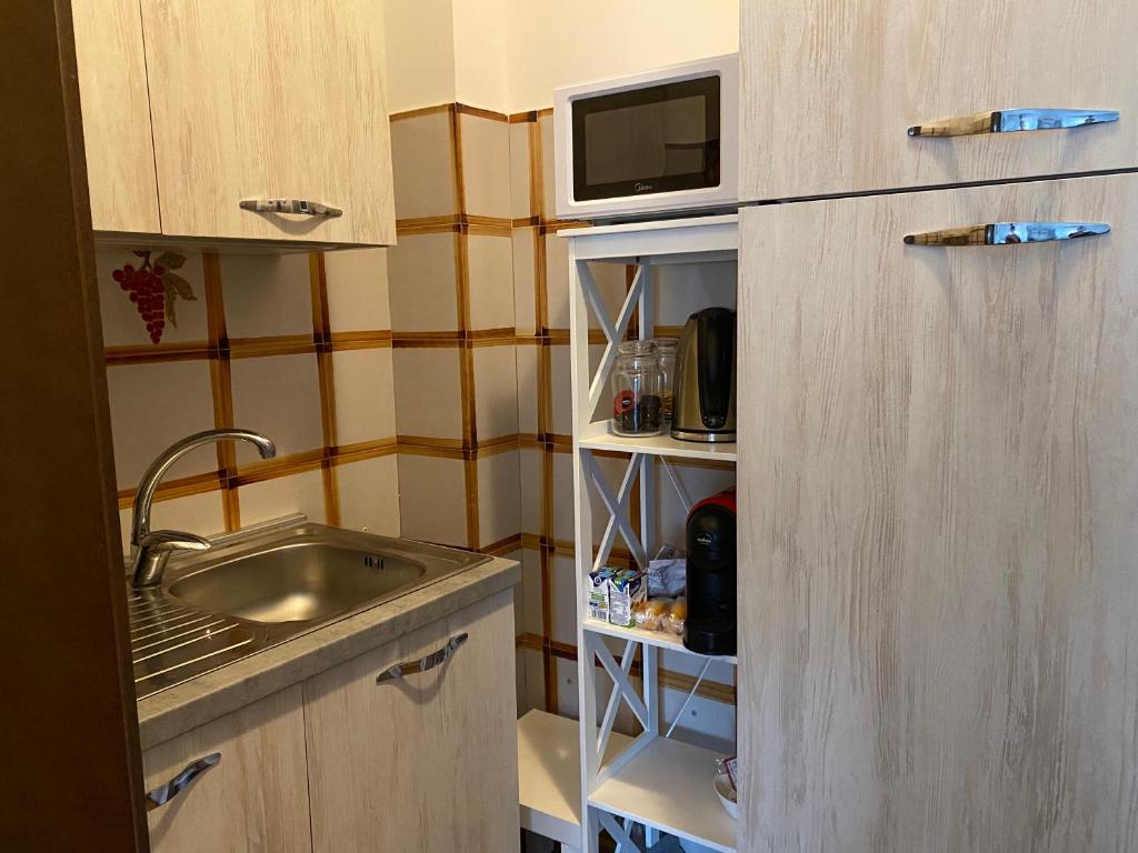 Kuchyň nebo kuchyňský kout v ubytování Casa Gaia- Castelnuovo del Garda
