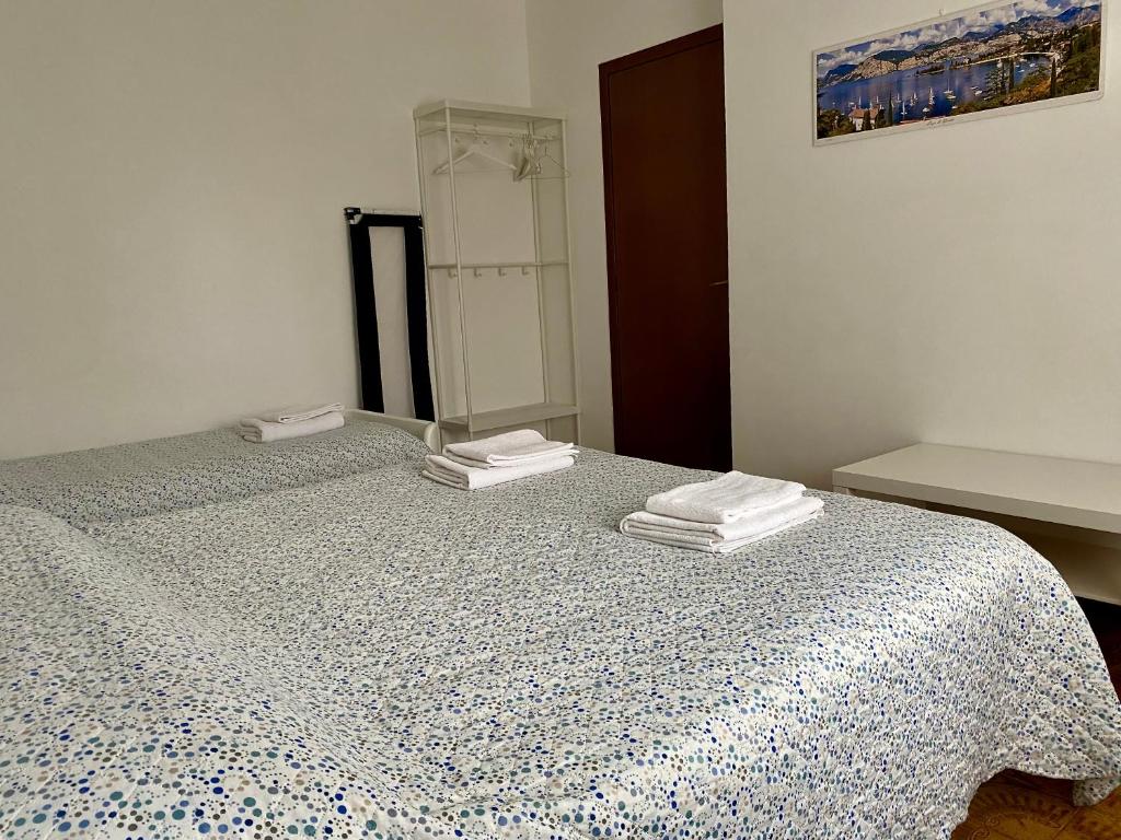 Postel nebo postele na pokoji v ubytování Casa Gaia- Castelnuovo del Garda