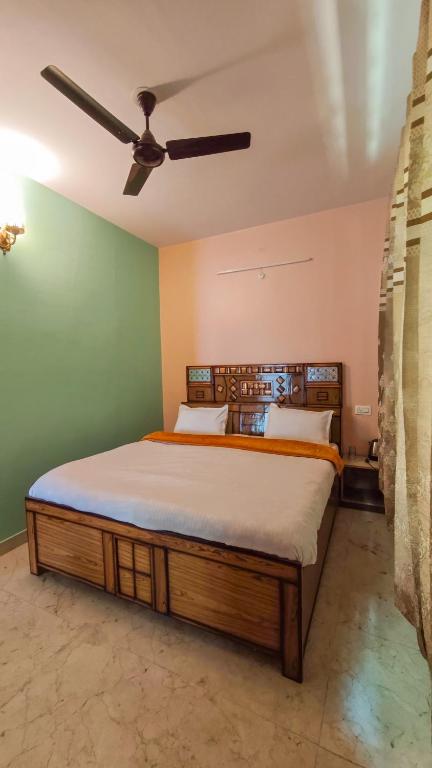 Postel nebo postele na pokoji v ubytování Green Valley View Homestay
