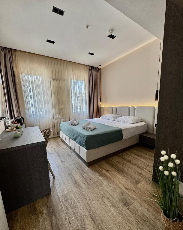 Voodi või voodid majutusasutuse Hotel Umma toas