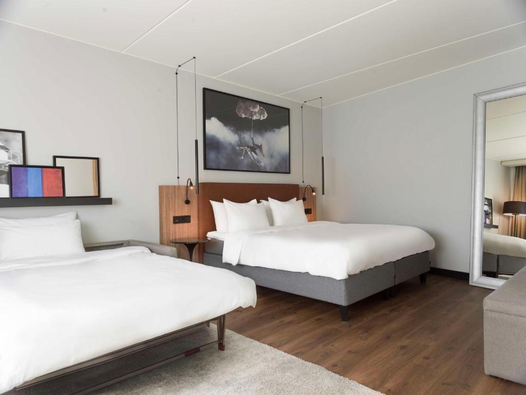 Postel nebo postele na pokoji v ubytování Radisson Blu Airport Hotel, Oslo Gardermoen