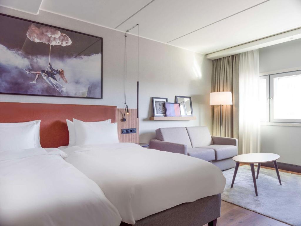Postel nebo postele na pokoji v ubytování Radisson Blu Airport Hotel, Oslo Gardermoen