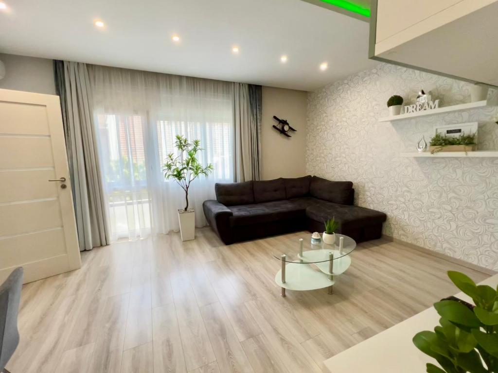 Posezení v ubytování Downtown Dream Apartmans