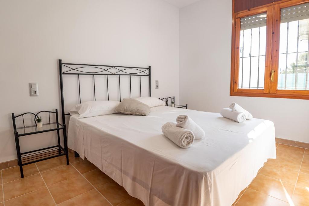 Postel nebo postele na pokoji v ubytování Casa Beatriz