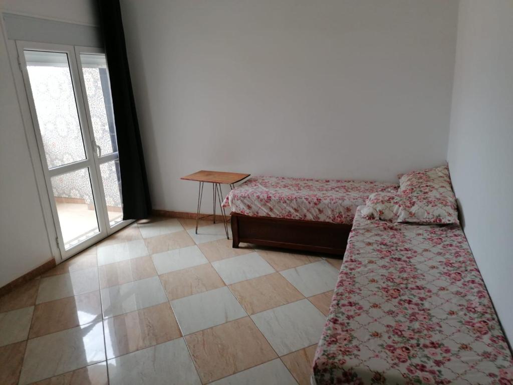 Katil atau katil-katil dalam bilik di Aparthotel Abed
