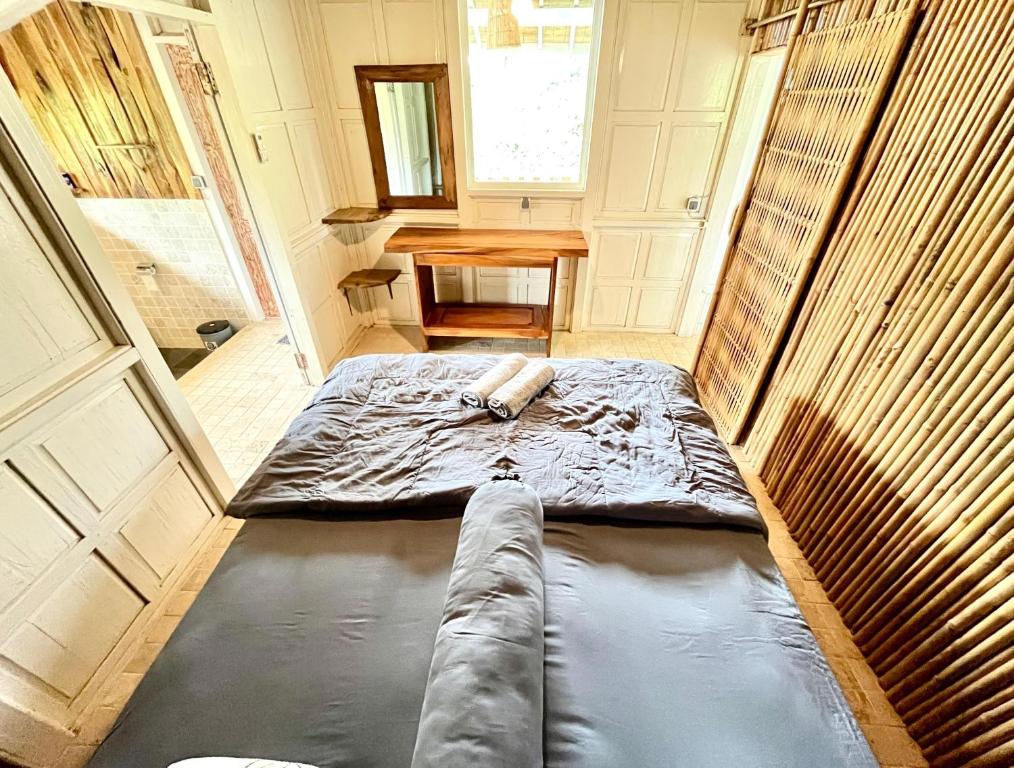 Postel nebo postele na pokoji v ubytování Pondok Is Oke Villa Scenic View