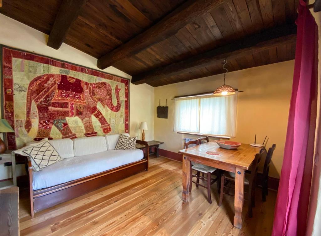 A bed or beds in a room at Podere di Maggio - Seccatoio
