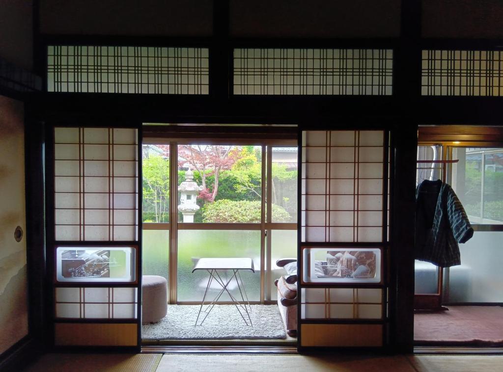 TV a/nebo společenská místnost v ubytování 駅前宿舎 禪 shared house zen