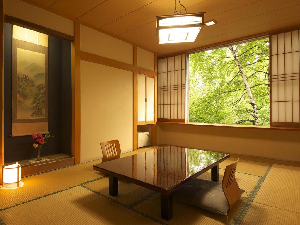 Posezení v ubytování Kusatsu Skyland Hotel