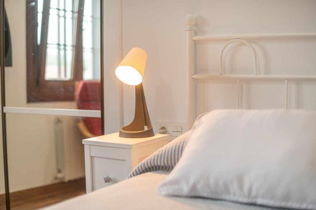 Postel nebo postele na pokoji v ubytování Apartamentos La Corrada de Andrín