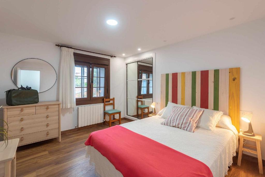 Postel nebo postele na pokoji v ubytování Apartamentos La Corrada de Andrín