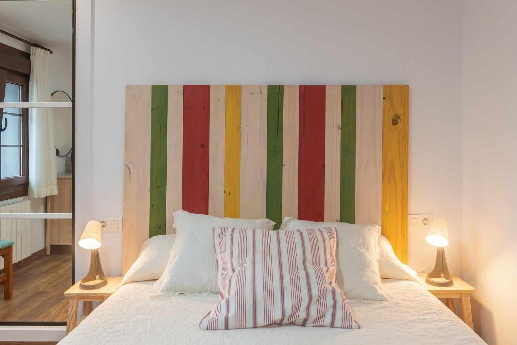 Postel nebo postele na pokoji v ubytování Apartamentos La Corrada de Andrín