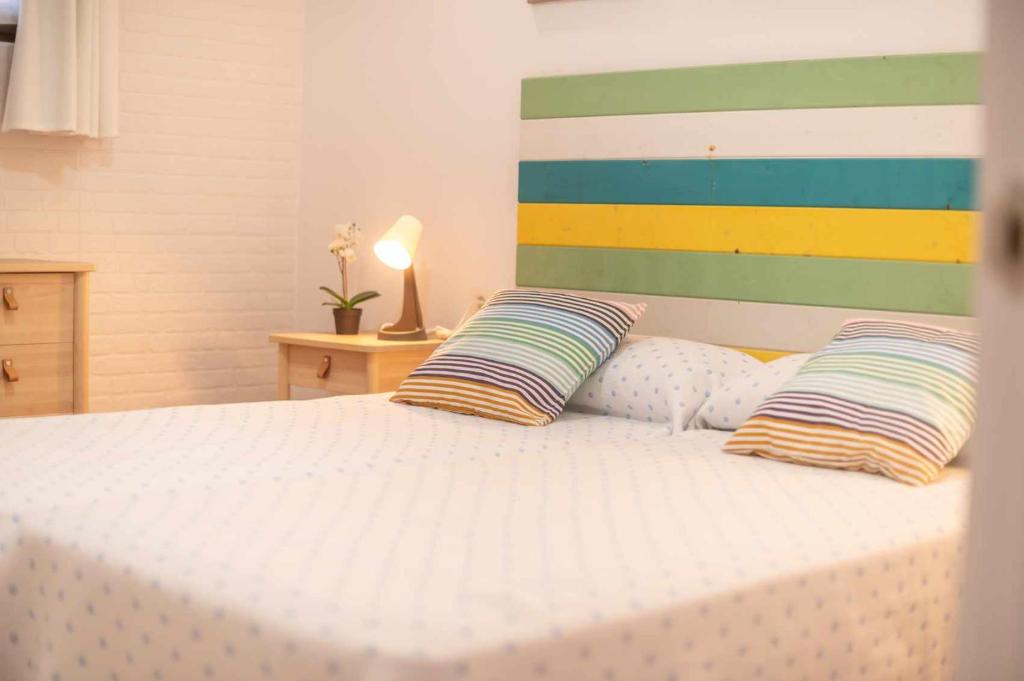 Postel nebo postele na pokoji v ubytování Apartamentos La Corrada de Andrín