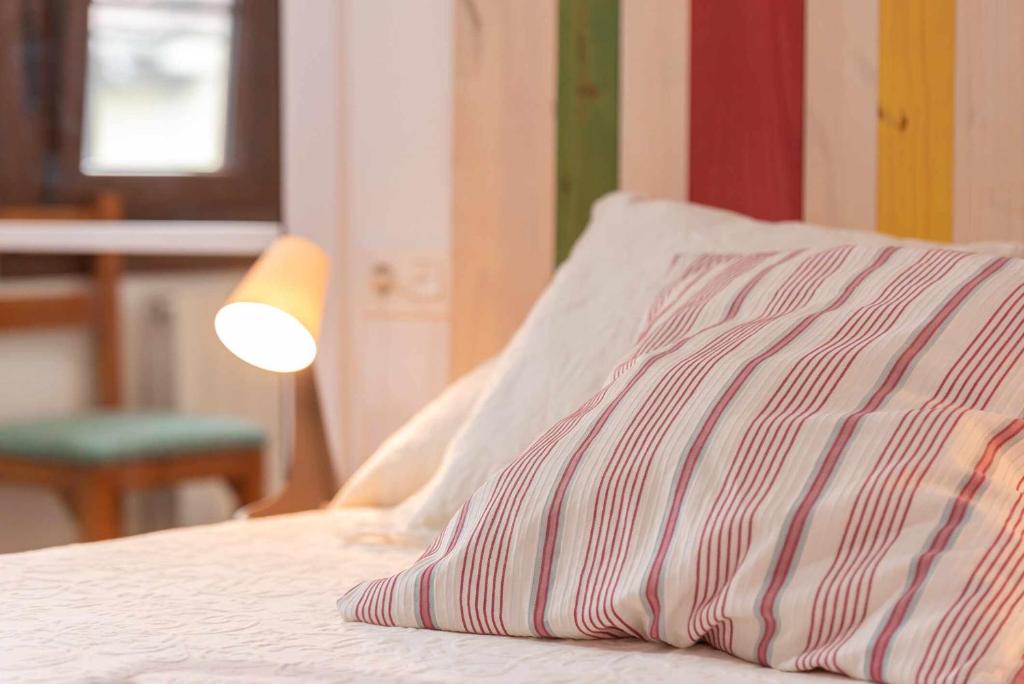 Postel nebo postele na pokoji v ubytování Apartamentos La Corrada de Andrín