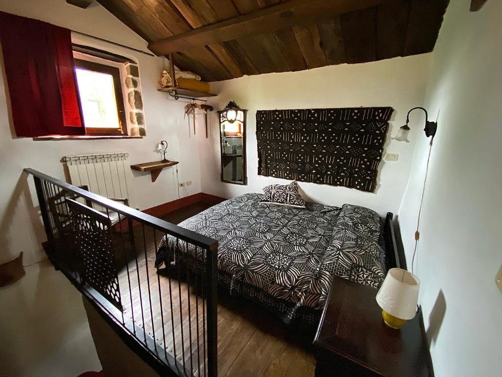 A bed or beds in a room at Podere di Maggio - Seccatoio