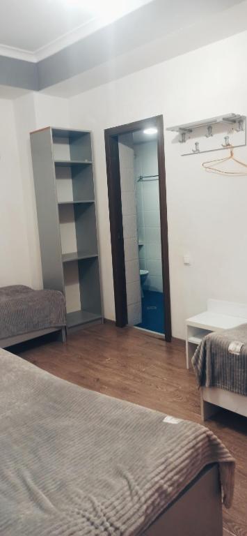 Postel nebo postele na pokoji v ubytování Apartments Lezzet