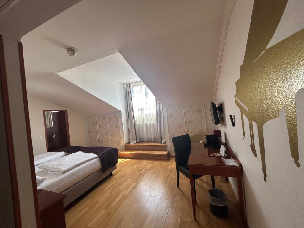 Hotel Am Schubertring客房内的一张或多张床位